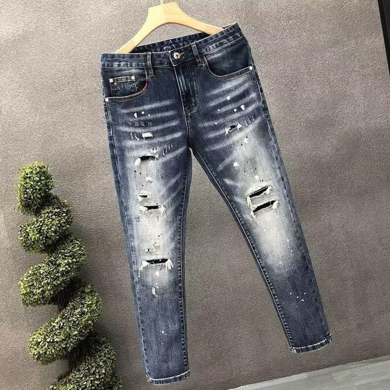 Spring and Autumn new ripped jeans men's elastic slim-fitting small feet trendy brand ruffian handsome point paint trendy fashion pants