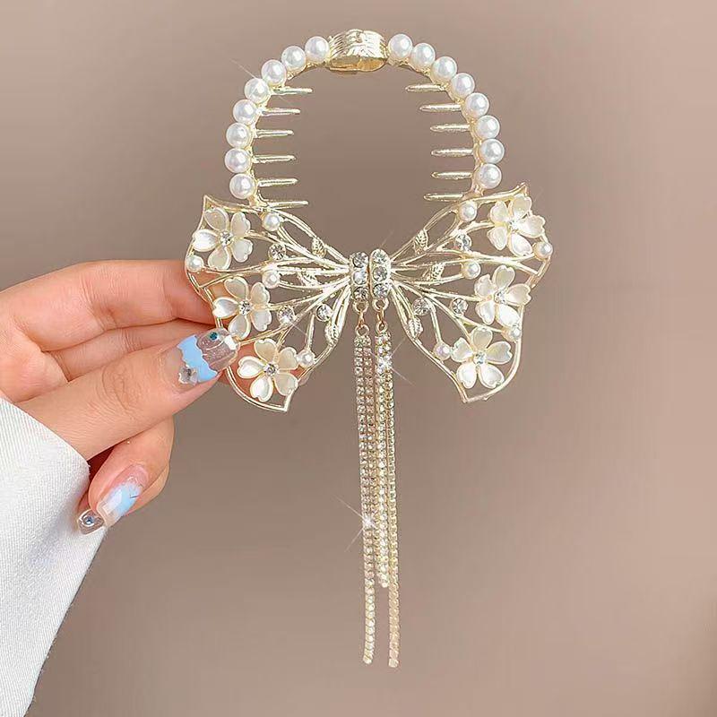 

Шпилька з китицею Конвалія - Елегантний аксесуар з трояндою та затискачем-крабом для жіночих зачісок напівзібране волосся