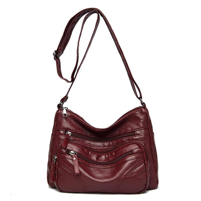 

Multi-pocket women s bag PU soft leather bag urban simple shoulder messenger mother bag темно-червоний колір