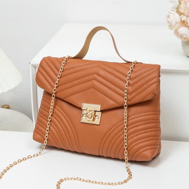 

New wavy lock, portable messenger small square bag, women s bag, casual chain bag. коричневый