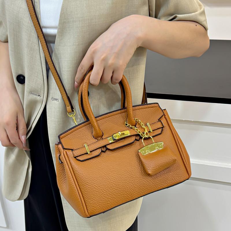Borsa Kelly sensazione alla moda motivo litchi borsa da donna nuova borsa a tracolla versatile di grande capacità borsa portatile platino