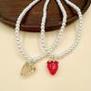 Koreansk version rosa jordgubbsberlock pärlhalsband dam äldre designkänsla nisch nyckelbenskedja halskedja dam sommar internetkändis