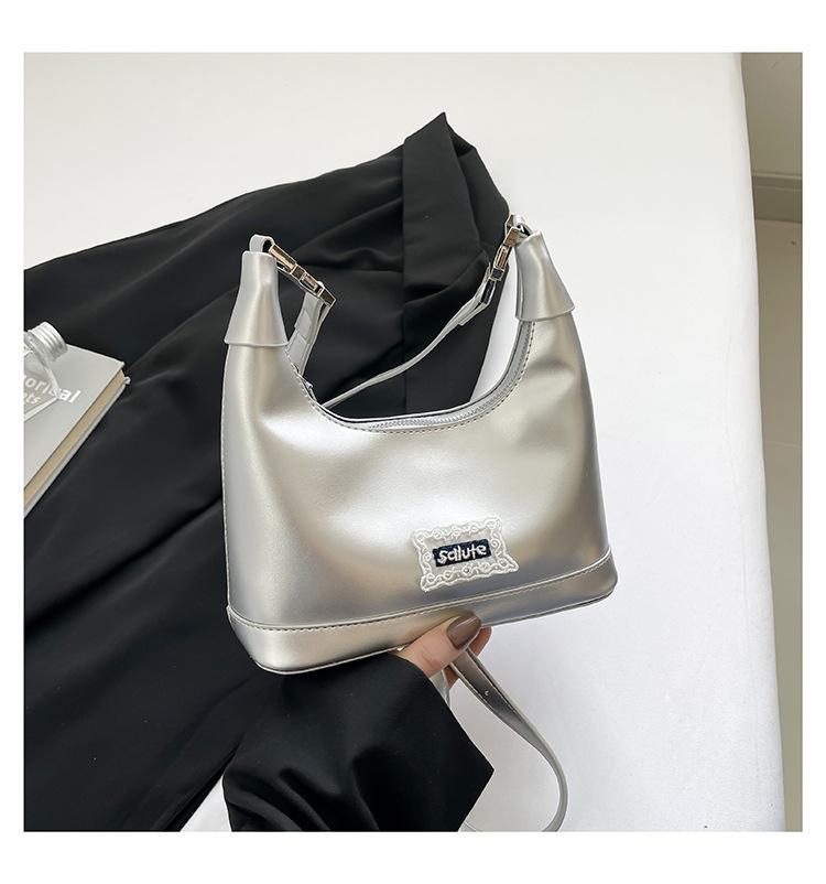 

Korean ins fashion trend hand-held dumpling bag 2025 new retro simple shoulder bag versatile messenger women s bag серебряный