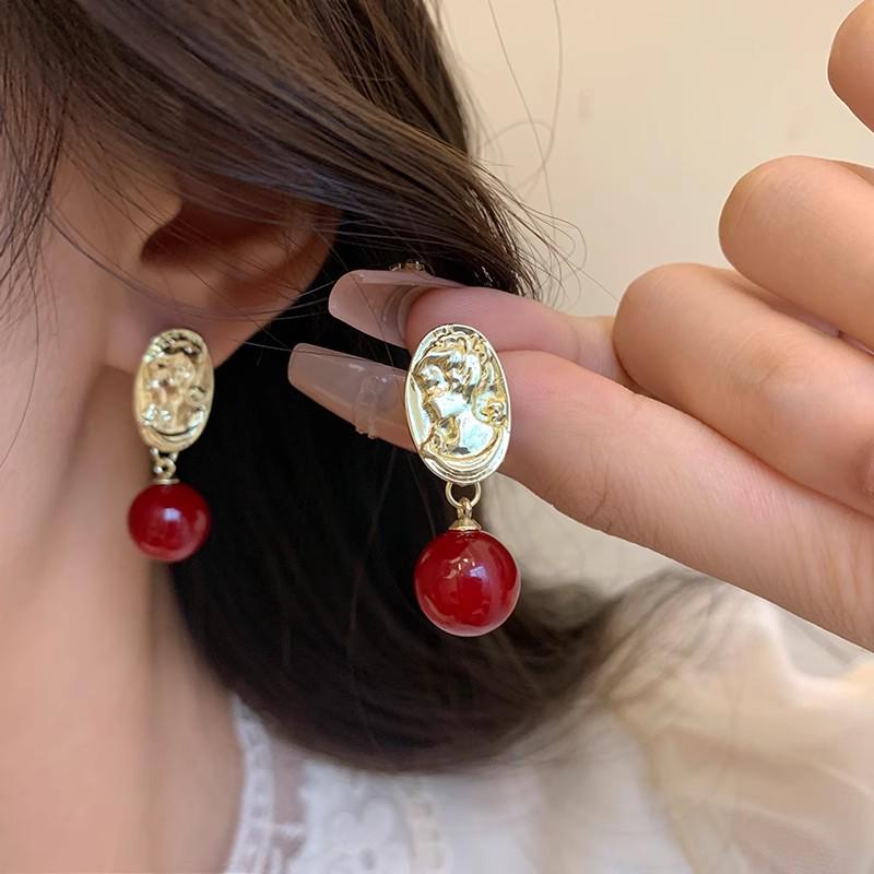 

Серьги-пусеты Angkor Red Sphere в стиле ретро - Уникальный женский дизайн