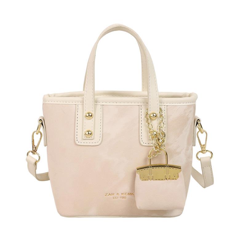 

Texture fashionable shoulder bucket bag women s 2025 spring new trend messenger bag foreign style solid color portable women s bag No pendant білий