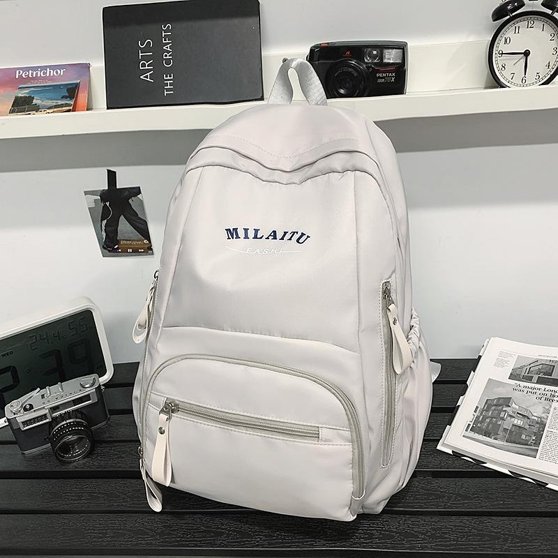 Large capacity simple schoolbag high school student backpack casual college student couple backpack