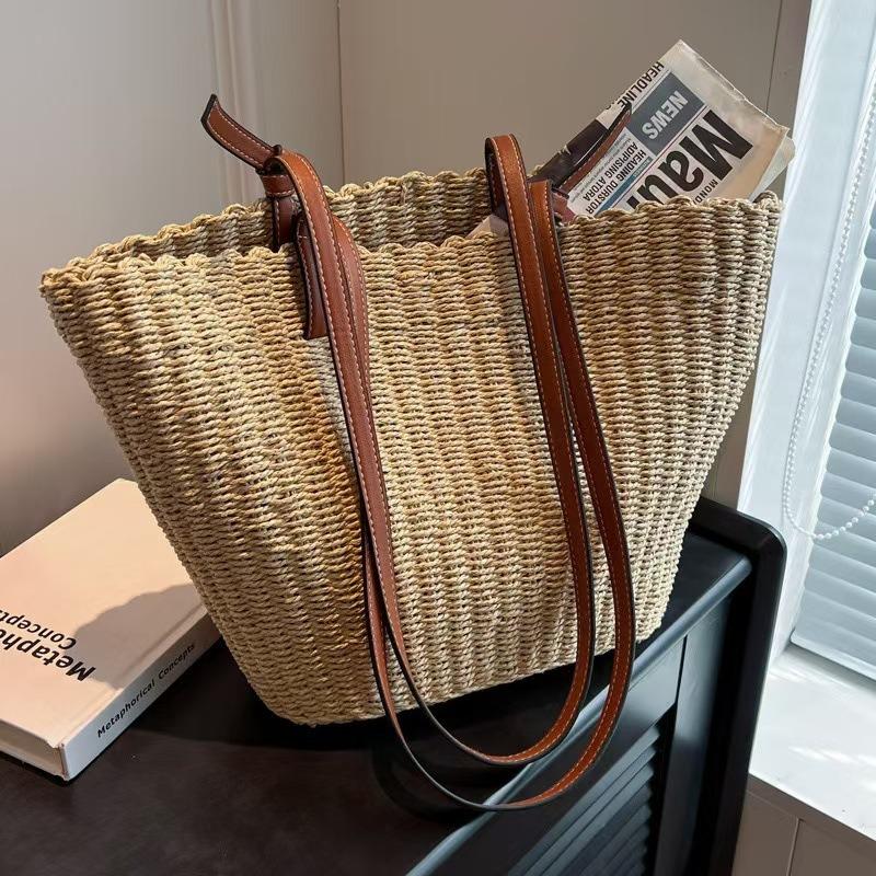 Neue Sommer vielseitige strohgewebte Tasche Damen gewebte Tasche große Kapazität Tragetasche Gemüsekorb Damen Tasche Urlaubs Umhängetasche