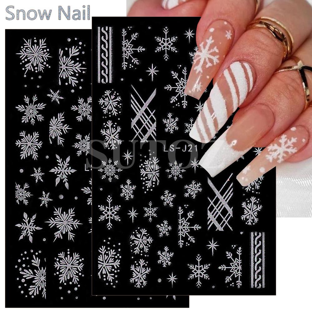 Winterweiße Weihnachts-Nagelsticker: Glitzernde Schneeflocken-, Herz- und Rentierdesigns
