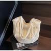 Borsa tessuta di grande capacità nuova borsa di paglia traforata borsa a tracolla stile pigro borsa da spiaggia primavera ed estate borsa da donna