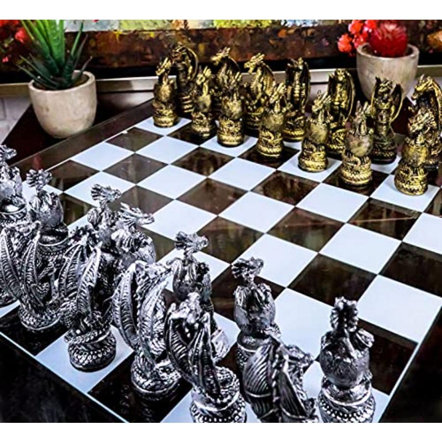 

Ebros Mythical Medieval Fantasy Silver and Gold Colored Dragon Old World Kingdoms Resin Chess Pieces with Frosted Glass Board S United States