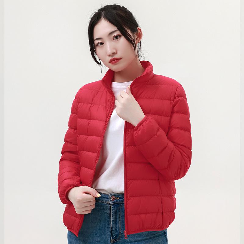 Autumn and winter new women's light stand-up collar hooded down jacket white duck down women's slim fit large size light jacket
