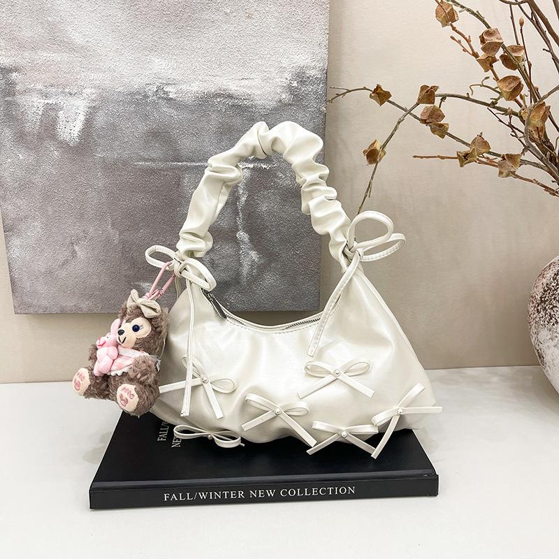 Niche pleated bow dumpling bag women's 2026 spring new Korean light luxury texture shoulder armpit bag