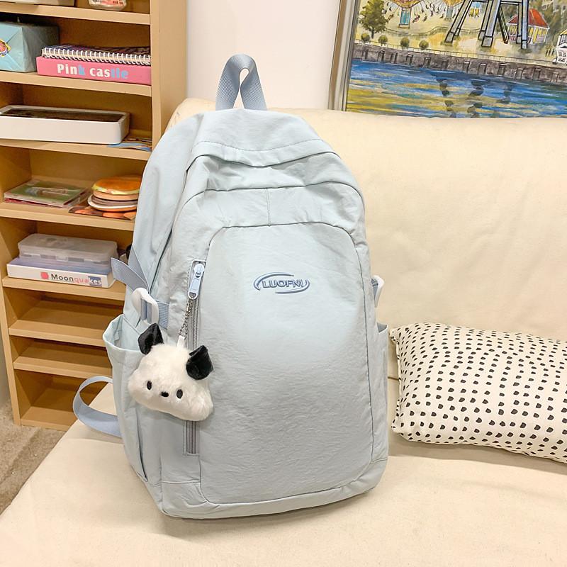 Simple Solid Color Letter Embroidery Student Backpack With Plush Pendant For Middle School Students