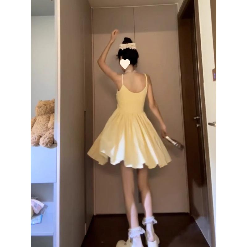 Yellow suspender dress children's summer new small seaside vacation temperament fluffy short skirt