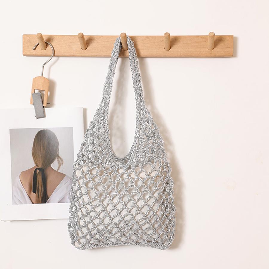 

Gold/silver bright paper ropes hollow woven bags cott lining straw bag female Reticulate handbag netted beach shoulder bags 20x5x20cm серебряный