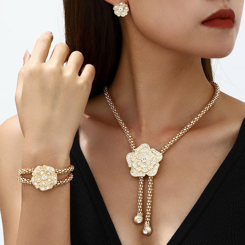Elegant Floral Rhinestone Jewelry Set: Necklace, Bracelet, Earrings, Ring