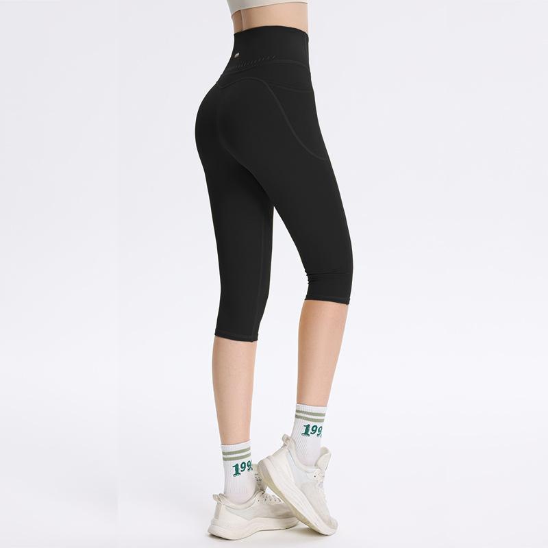 

Sports shorts 2025 new nude skin-friendly yoga cropped pants pocket women s elastic tight hips fitness running sweatpants summer S
