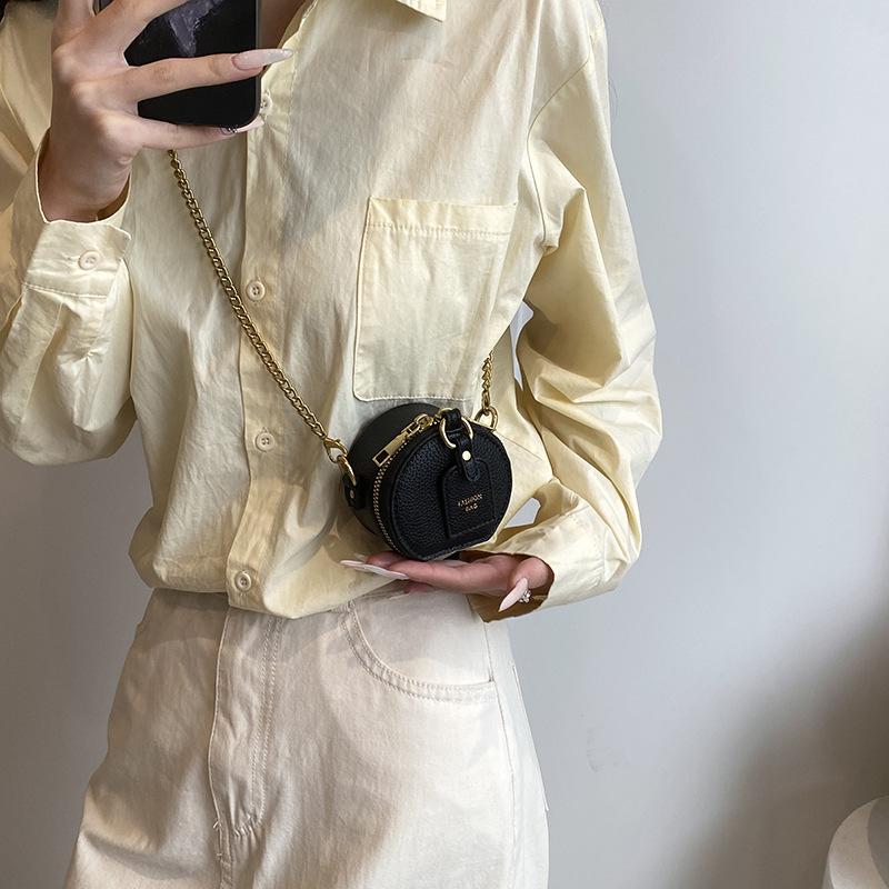 Exquisite and cute mini small pu solid color women's change mouth red envelope 24 spring new shoulder messenger bag