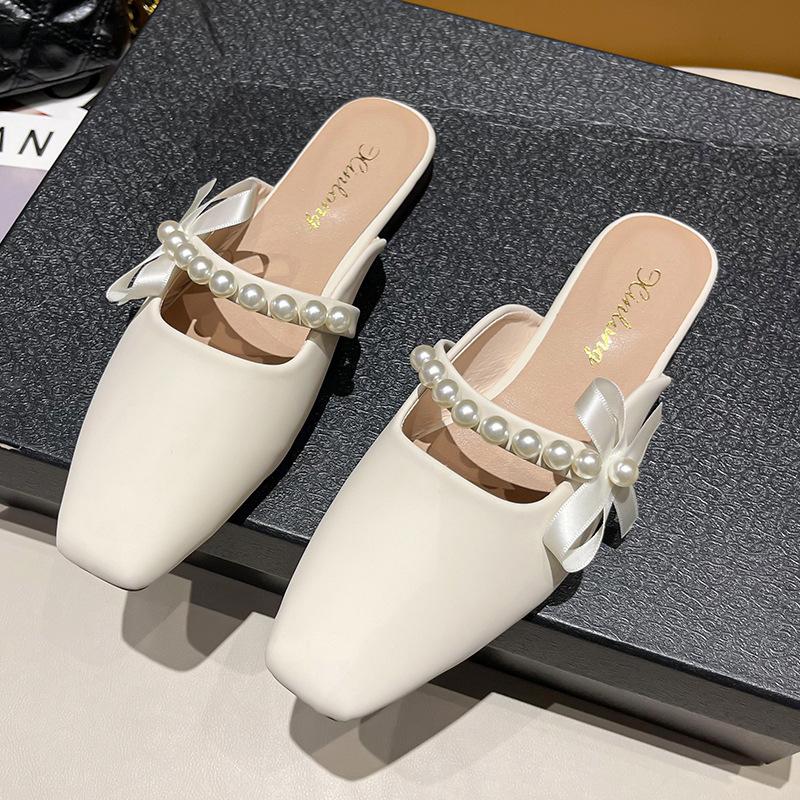 

French bag head half slippers women s outer wear spring and summer 2025 new niche fashion versatile flat shoes sandals 35
