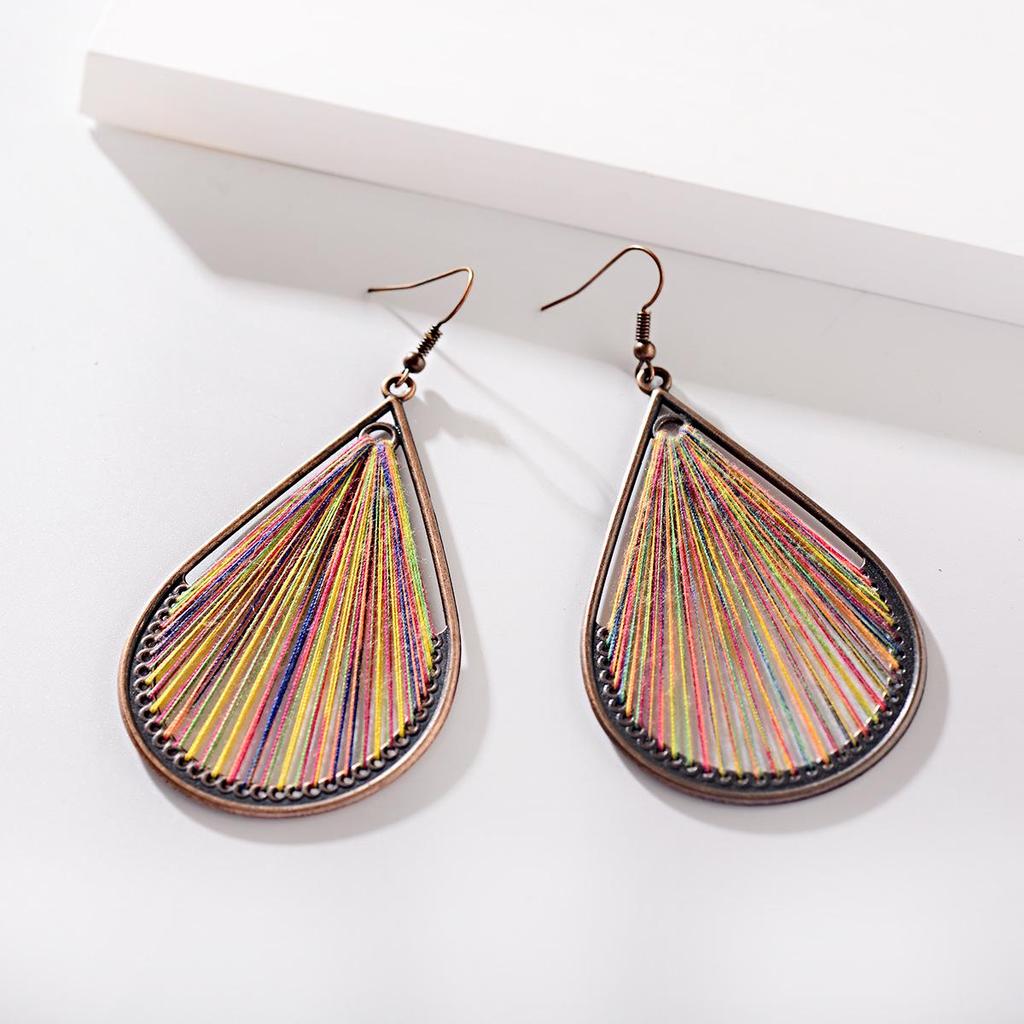 Yunnan Ethnic Bohemian Feather Earrings - Exaggerated No-Pierce Clips for Women