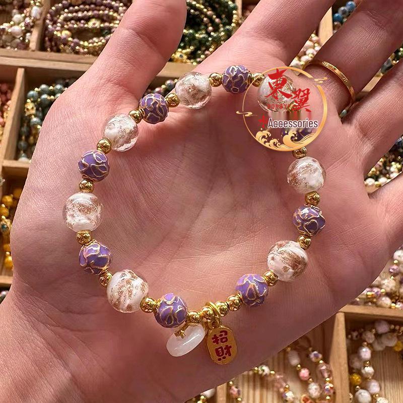 White Luminous Gold Sand Purple Cloisonné Ping An Kou Na Fu Bracelet with Gold Foil accents.