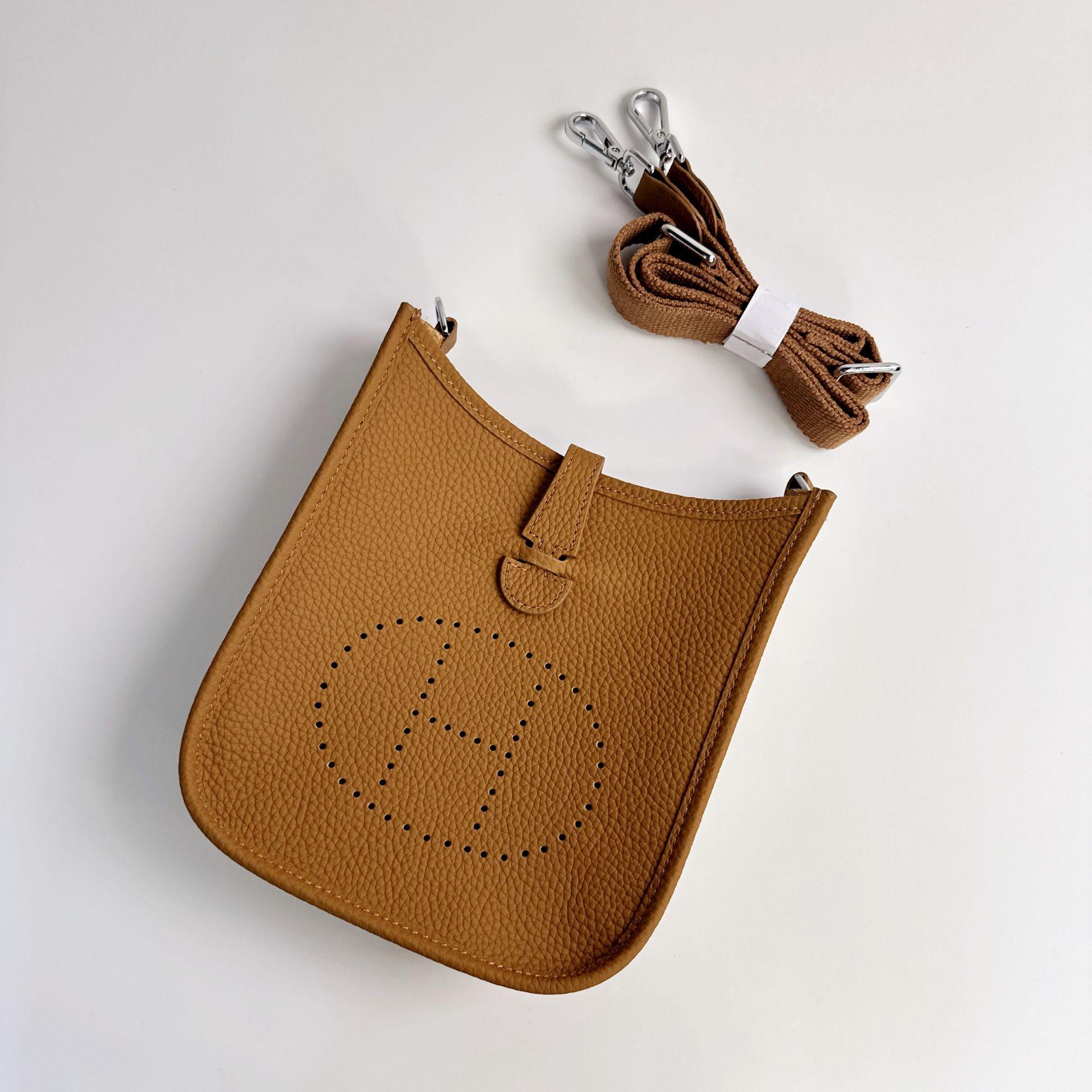 

Aomen Bao Женская сумка через плечо из натуральной кожи Высококлассная сумка-тоут из коровьей кожи с H-пряжкой, полая плетёная сумка с одним отделением 30x11x28cm коричневый