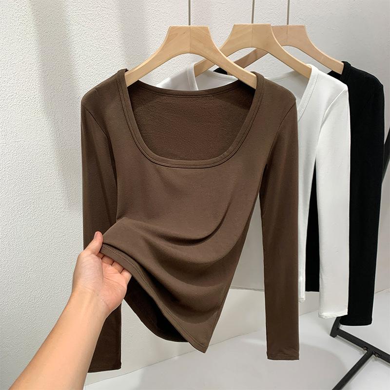 

Grinding bottoming shirt women s autumn and winter 2025 new women s clothing temperament big U-neck long-sleeved T-shirt solid color inner waist top 2XL темно-коричневого