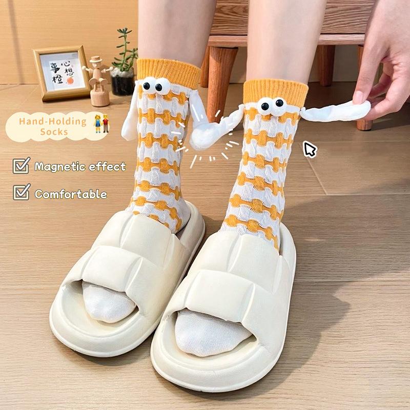 Creative Winter New Fun Magnet Big Eyes Holding Hands Couple Long Socks Dopamine Warm And Comfortable Long Socks Gifts