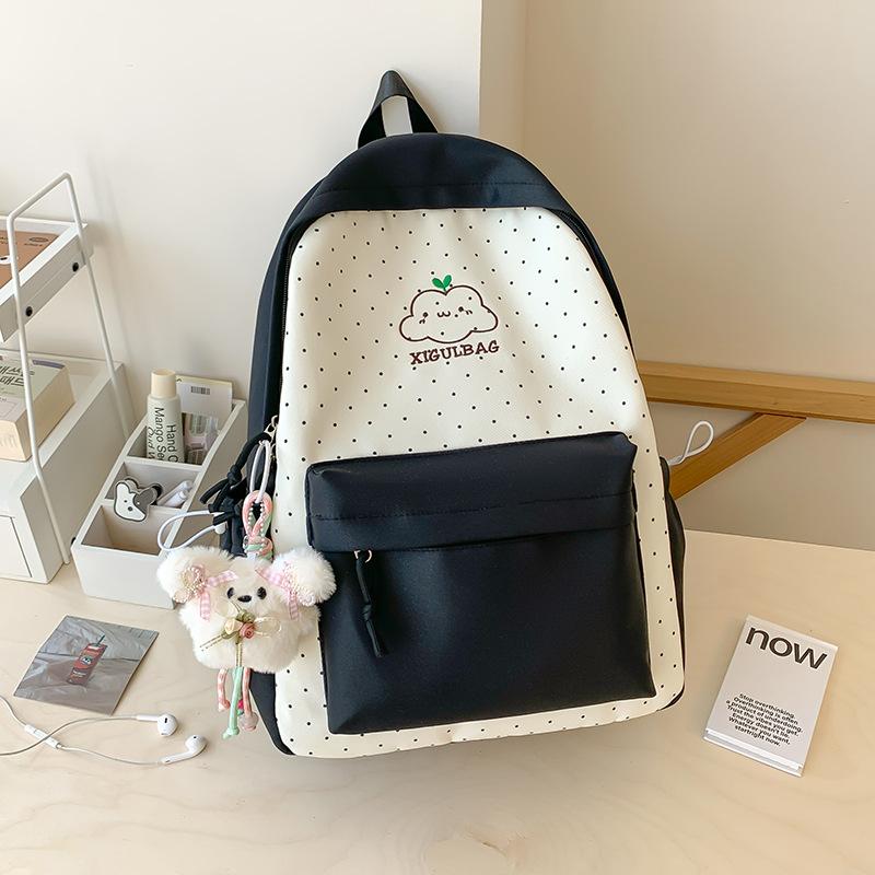 Schoolbag schoolbag junior high school girl cute girl heart polka dot backpack large capacity college student 1011 new backpack