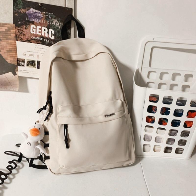 Minimalist School Commuter Backpack with Detachable Duck Plush Keychain Multi Pocket Lightweight Rucksack for Students Travel