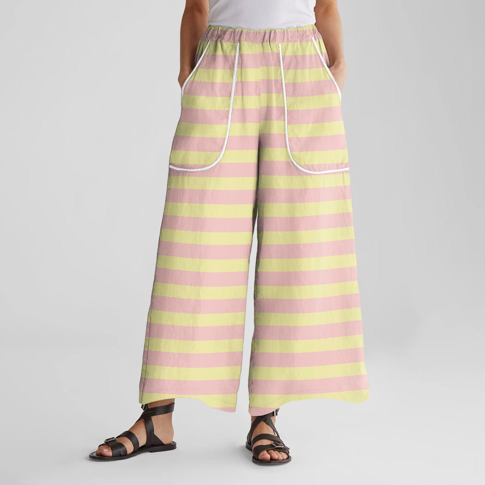 

Женские брюки широкие от бедра с эластичным поясом, с принтом, с большими карманами, с отделкой пэчворк по краю, свободные XL жёлтый