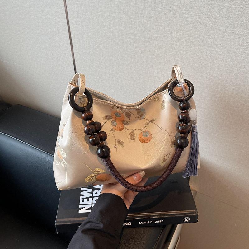 

Foreign style texture simple fashion trend niche design shoulder bag autumn new 2025 women s personalized armpit bag бежевый