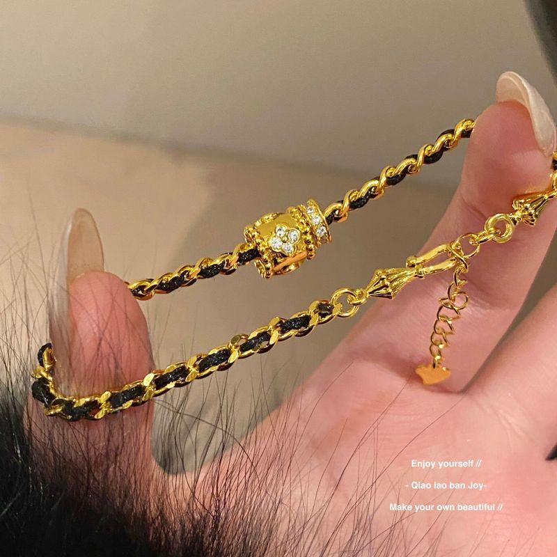 

[Босс Цяо Джой] Классический стиль плетеный браслет Клевер Черное золото Ремешок для переноски Дорогая Доступная Роскошь Текстура Классный Default