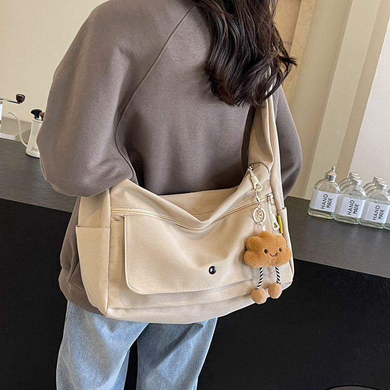 Tooling messenger bag women's 2025 new shoulder bag Hong Kong style large capacity trend leisure bag tide student class backpack