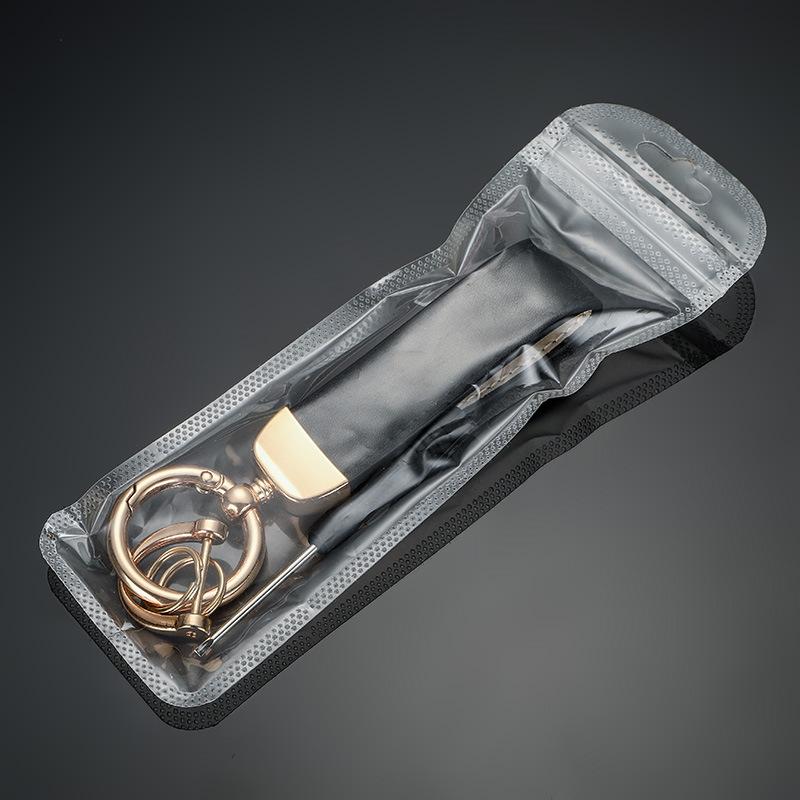 

Металлический брелок-фигурка с цветовыми блоками: Стильный кожаный аксессуар для мужчин и женщин для дома, мотоцикла и автомобиля.