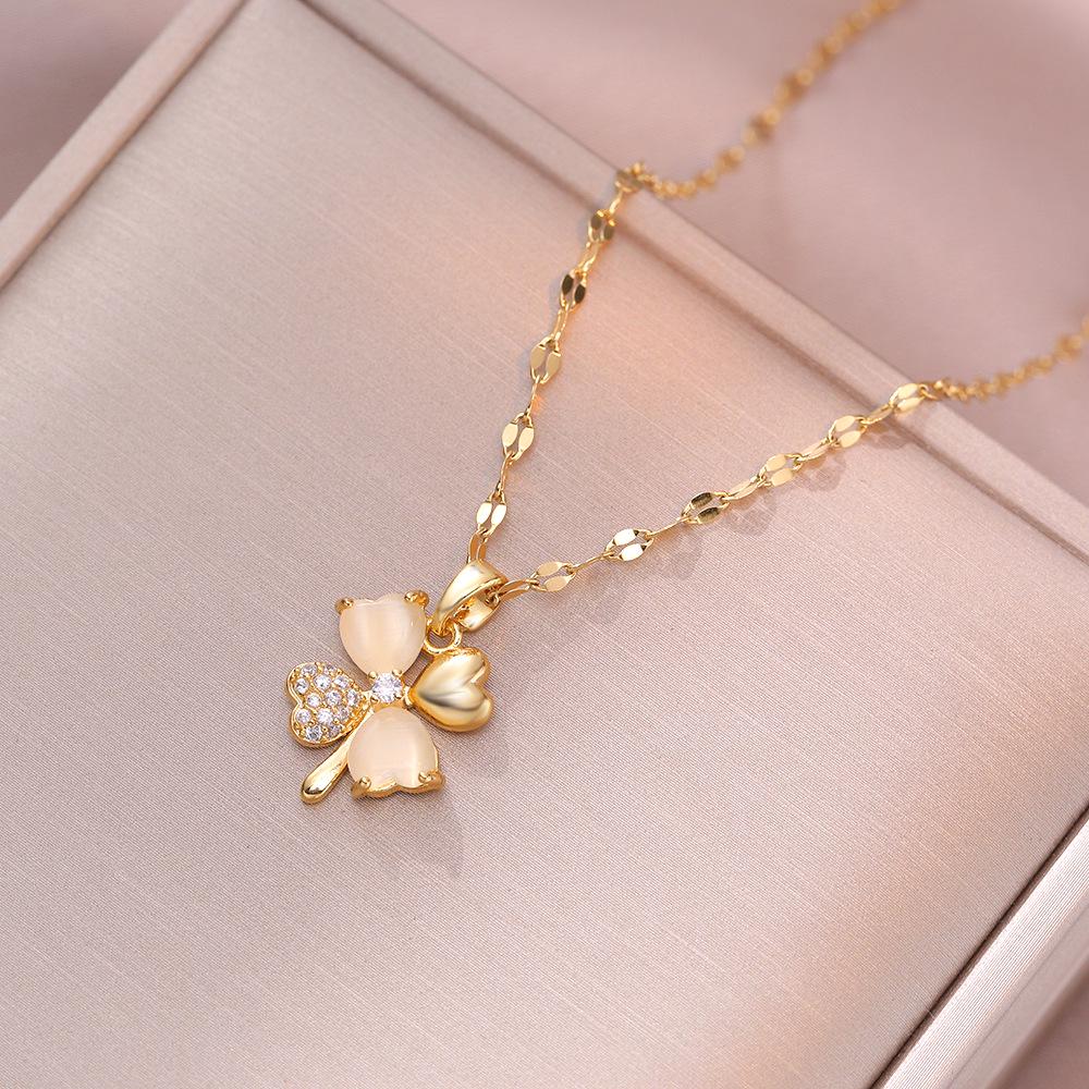 Women's Titanium Steel Necklace - Four-Leaf Zircon Flower & Cat's Eye Stone Pendant, New Design.