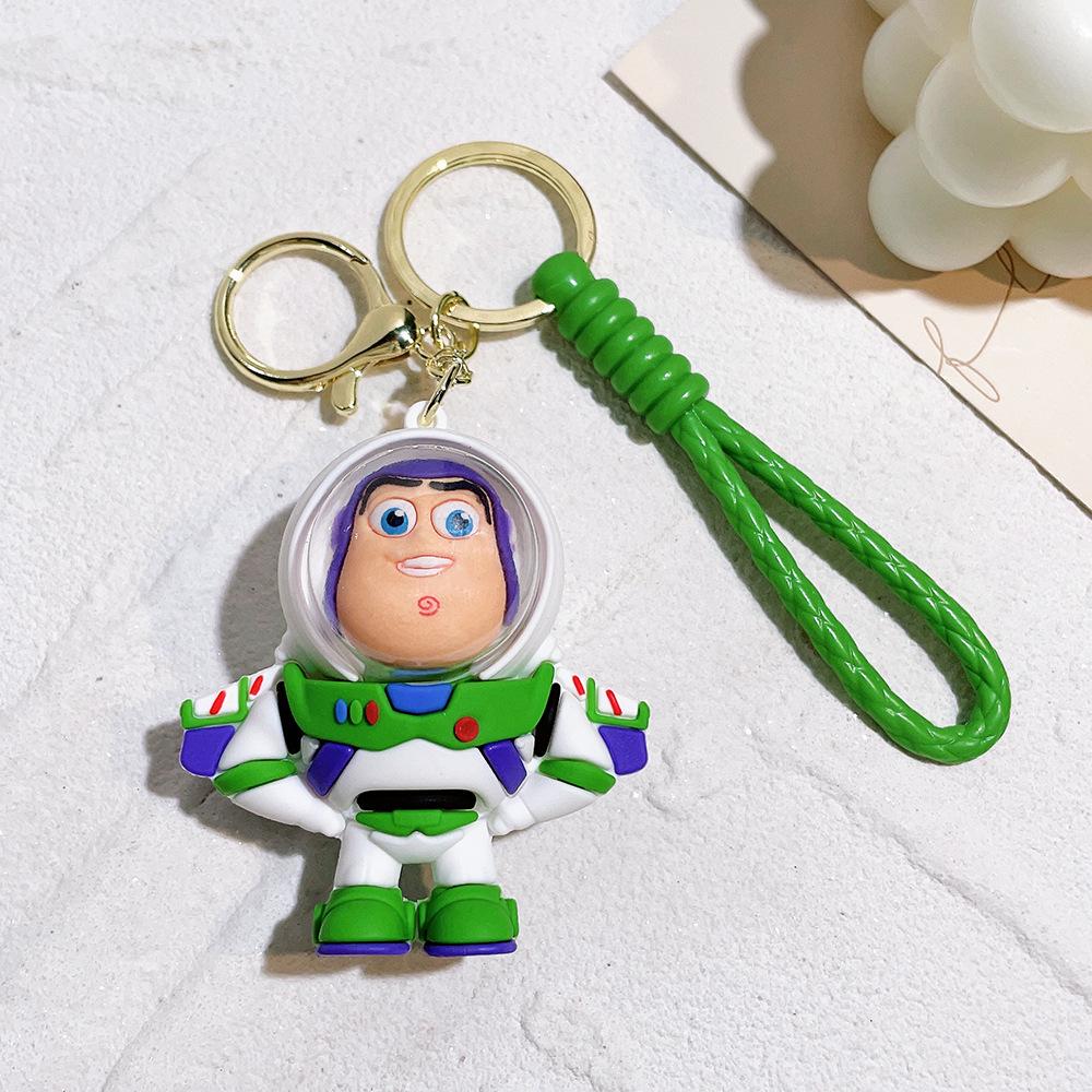 Best-Selling Toy Story Figures Keychain: Three-Eyed Alien, Buzz Lightyear, and Strawberry Bear Charms