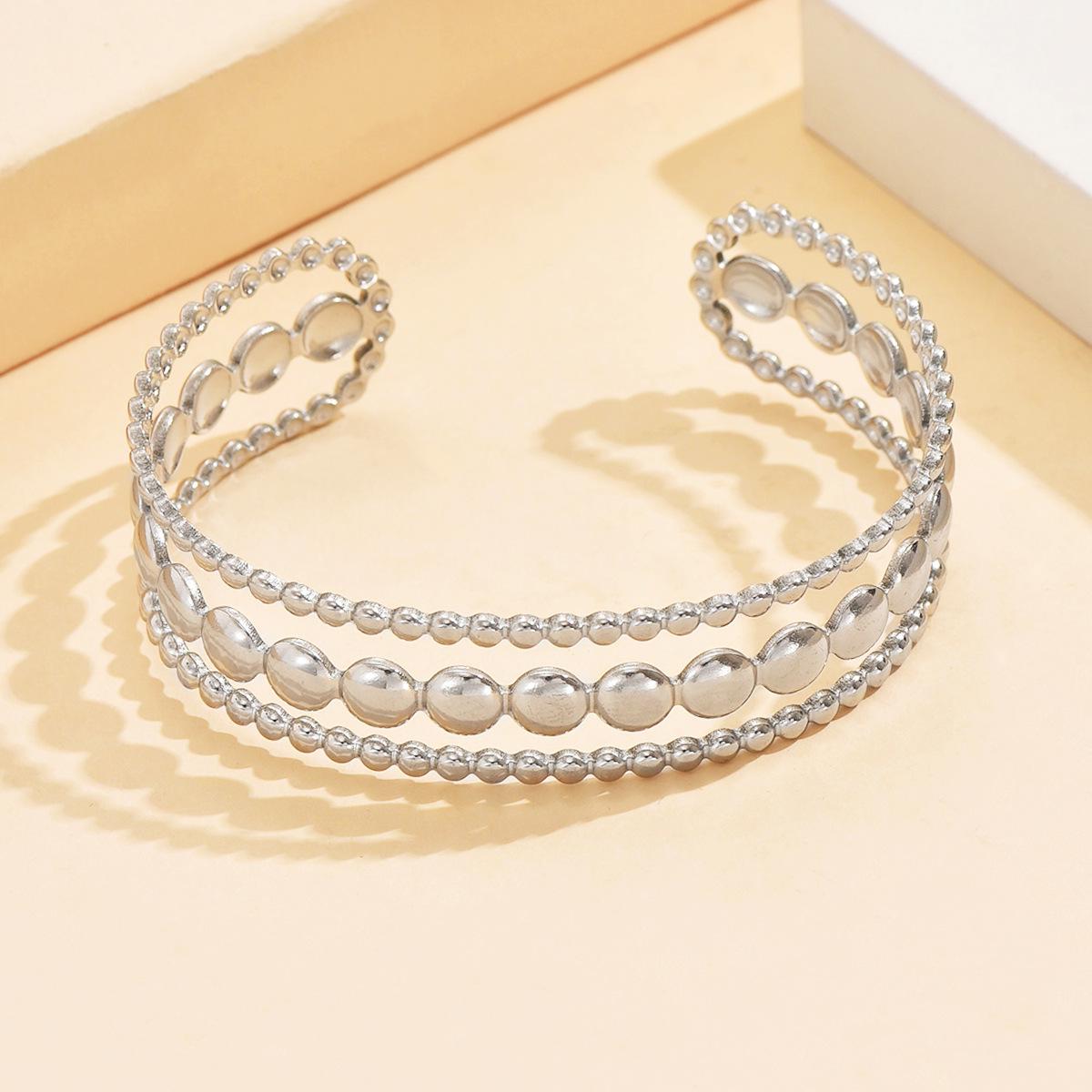 Versatile Stainless Steel Hollow Geometric Polka Dot Open C-Shaped Women s Bracelet