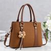 Simple commuting classic flower tassel decorative handbag new gentle temperament crossbody shoulder