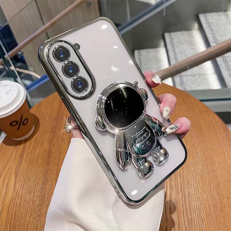 Astronaut Stand Suitable for Samsung S24ultra Mobile Phone Case S23Plus Gradient Flash Powder S22 Astronaut