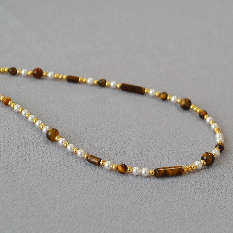 European and American niche retro Maillard wind tiger's eye stone pearl splicing beaded asymmetric necklace collarbone chain