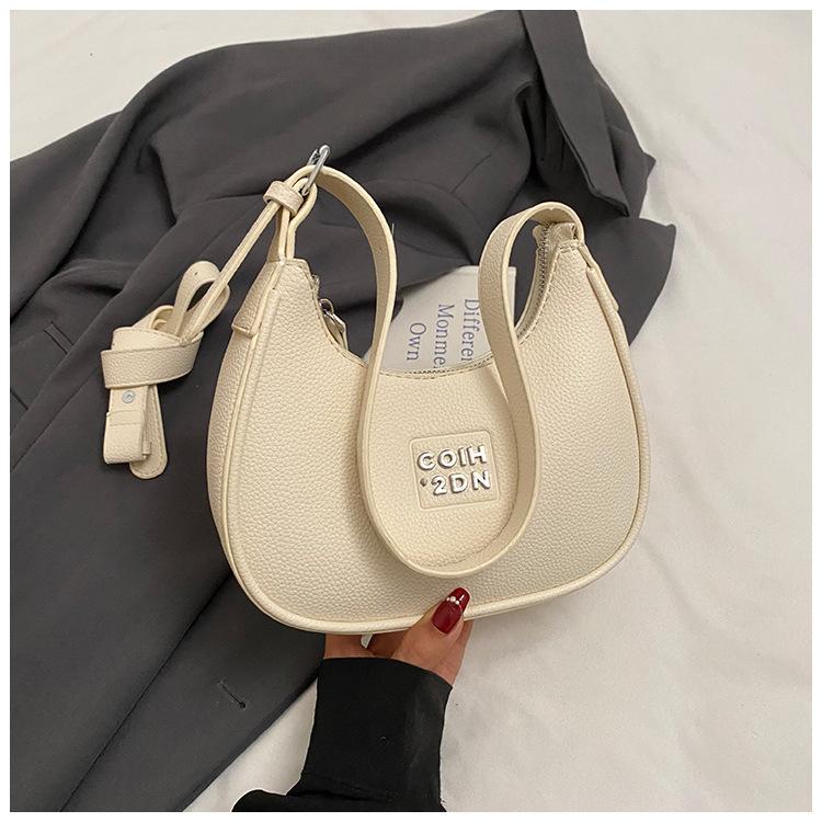 

This year s popular new moon bag women s 2025 summer new fashion versatile foreign style texture messenger bag commuter shoulder bag белый