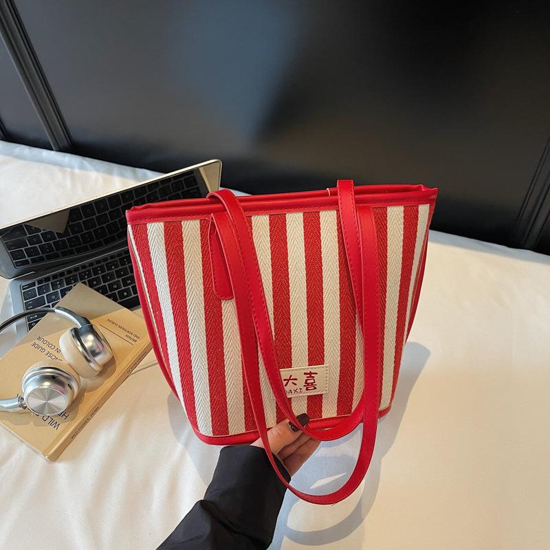 2025 summer new striped large-capacity fashion Korean version handbag personalized ins shoulder underarm bag tote bag