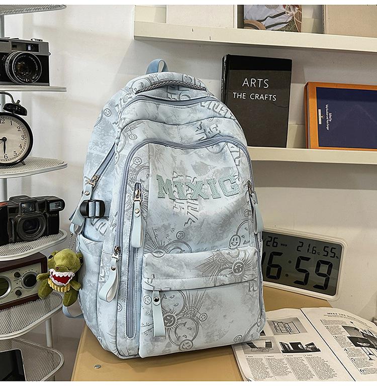 Schoolbag trendy school bag male high school student female graffiti junior high school student backpack college student large capacity lightweight