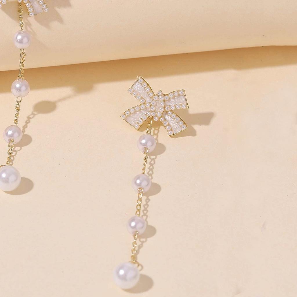911 Silver Needle Oil Drop Bow Pearl Stud Earrings Fashion Design Earrings Internet Celebrity Temperament Personality Trendy Earrings E8111