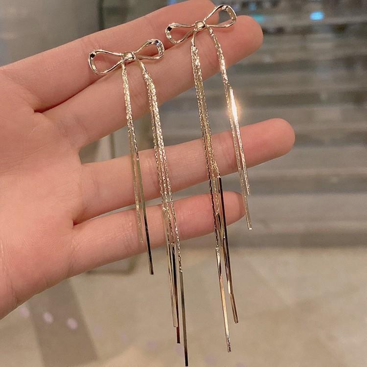 

European and American exaggerated metal bow fringed stud earrings women s s111 silver needle fashion personality temperament long earrings 925 silver needle