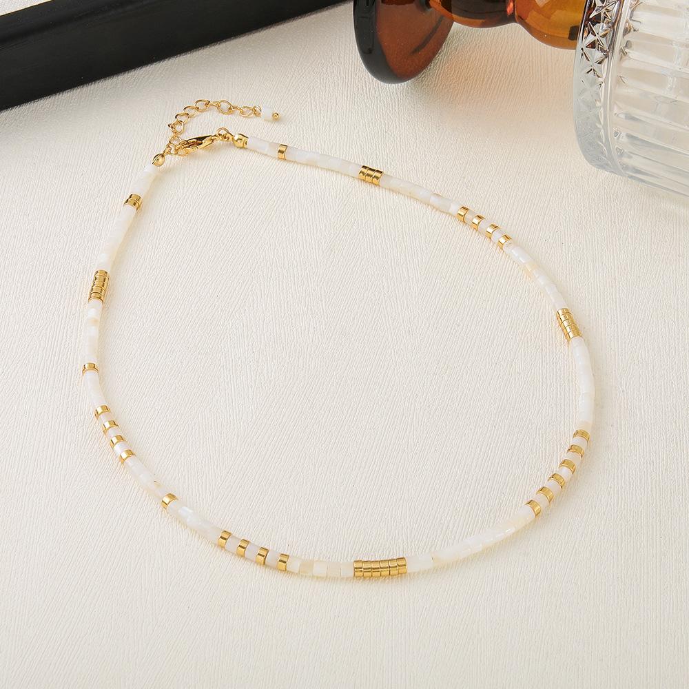 GEMCHIC Women s Bohemian White Shell Bead Necklace with Gold Geometric Accents