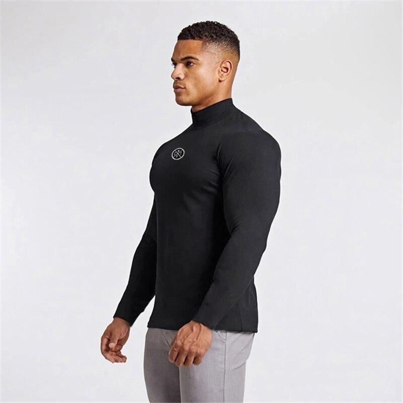 Muscleguys Spring and Autumn Gymnastics Men's Long Sleeves Tight Elastic Sports Tops White Breathable Training Shirts
