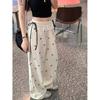 Damen Süß & Würzig Spitze Patchwork Lässige Hose mit Schleife, Elastischer Bund, Weiter Beinschnitt, Gerades Bein Design für den Sommer.