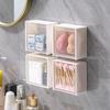 Badkamerwandopbergdoos van kunststof met klapdeksel voor make-up, wattenstaafjes en andere toiletartikelen.